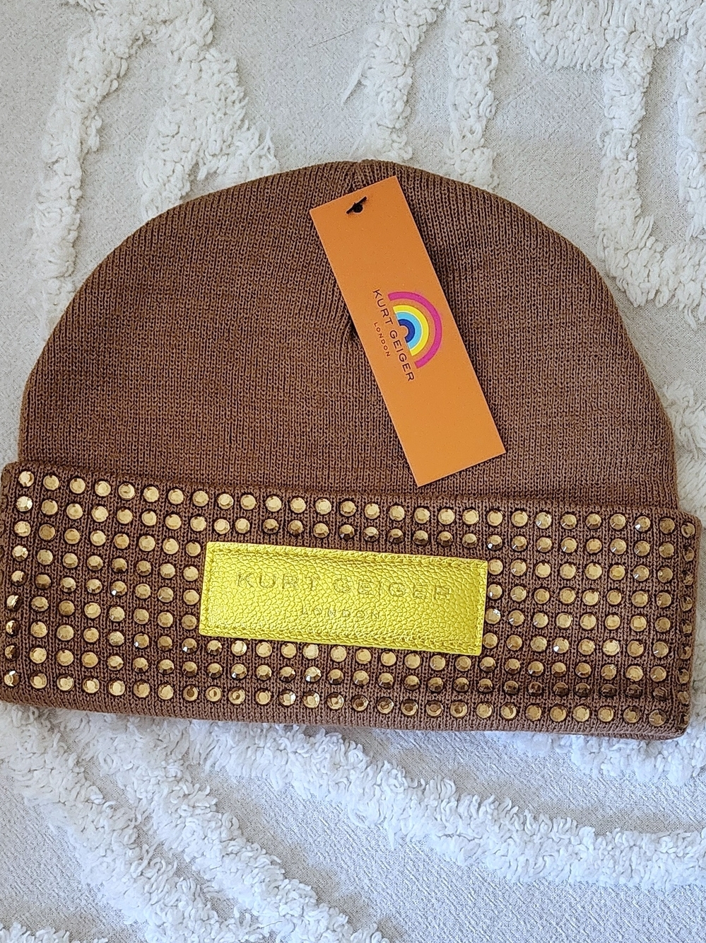 Kurt Geiger Taupe Knit Beanie With Gold Logo Plaque And Studs - Picture 3 of 3